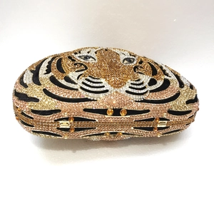 Detailed top view of tiger-shaped evening bag featuring intricate rhinestone crystal patterns