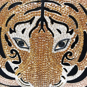 Luxury tiger head evening bag with sparkling rhinestone embellishments and gold accents