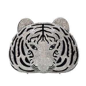 Luxury tiger head evening bag with sparkling rhinestones and hollow metal structure