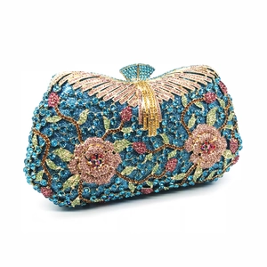 Royal blue rhinestone clutch purse with floral crystal patterns for evening galas