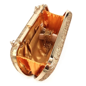 Detail of gold sequin evening clutch bag showing orange satin interior and chain strap