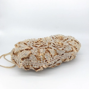 Detailed view of hollow rose evening bag with premium crystals and gold finish