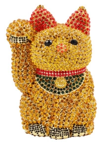 Close-up of rhinestone-encrusted lucky cat clutch bag with detailed crystal embellishments