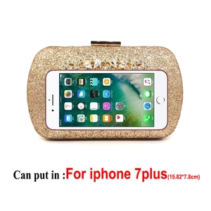 Golden sequin evening clutch with diamond clasp showing size comparison to a smartphone