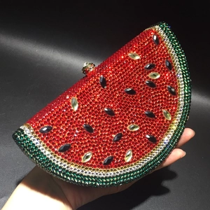 Detailed view of handmade watermelon crystal clutch with red and green rhinestones