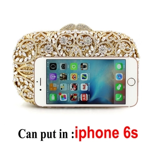 Golden rhinestone evening clutch with hollow floral pattern showing iPhone 6s capacity