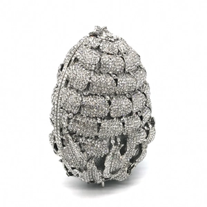 Silver hollow out pineapple patterned clutch bag with sparkling diamond crystal inlay