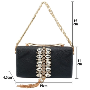 Detail showing dimensions of black evening clutch with crystal tassels and gold chain