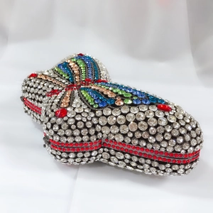 Detailed view of the hollow butterfly evening bag with colorful rhinestone embellishments
