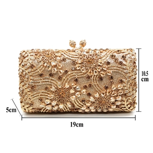 Golden clutch bag with floral crystal patterns and 19x10.5x5cm dimension markers