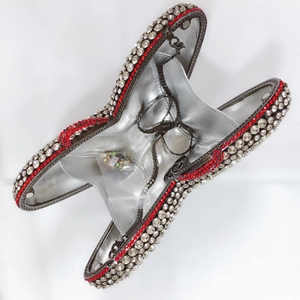 Elegant butterfly-shaped silver clutch evening bag with red and white rhinestones