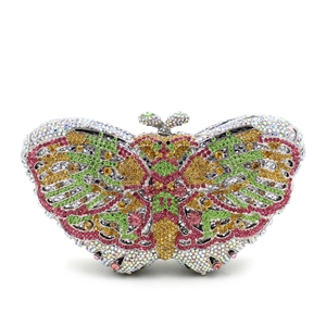 Close-up of vibrant crystal-encrusted butterfly evening clutch with ornate metal clasp