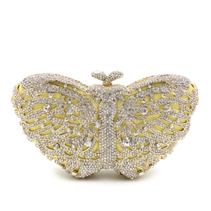 Detail of butterfly evening clutch featuring yellow satin and intricate crystal embellishment