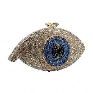 Detail of evil eye evening clutch with blue and silver crystals and butterfly clasp