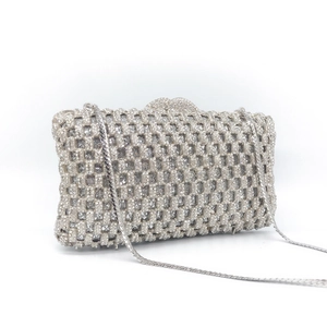 Elegant silver rhinestone evening clutch bag with crystal lattice and metal chain strap