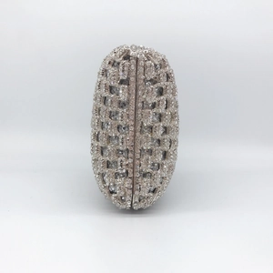 Elegant silver rhinestone evening clutch bag with hollow metal frame and diamond embellishments