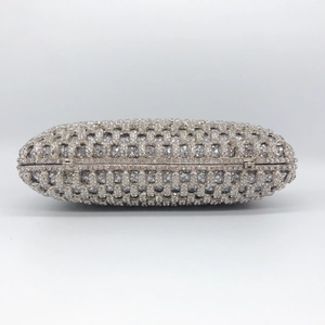 Elegant silver rhinestone evening clutch bag with sparkling crystal metal frame for parties