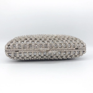 Sparkling silver rhinestone clutch bag with a metal hard shell frame for evening parties