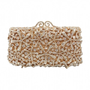 Elegant gold starfish evening clutch with sparkling rhinestones and crystal metal frame