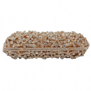 Detailed macro view of the golden metal frame with sparkling crystal rhinestone inlay