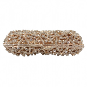 Detailed close-up of crystal starfish evening clutch with gold-tone hollow metal frame