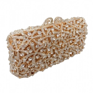 Detailed view of the sparkling rhinestone starfish evening clutch with a gold-tone frame