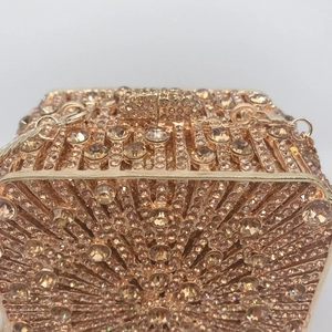 Golden champagne rhinestone evening clutch bag with metal frame for formal gala dinner