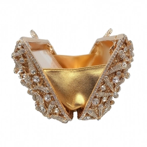 Detailed interior view of hollow metal starfish evening bag with sparkling rhinestones