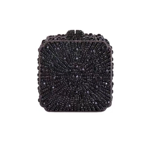 Detailed view of the luxury black crystal evening clutch with radiant rhinestone pattern