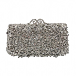 Detail of silver starfish evening clutch with hollow metal frame and crystal rhinestones