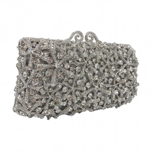 Detailed view of silver evening clutch with hollow starfish pattern and sparkling crystals