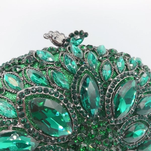 Exquisite emerald green crystal evening clutch bag with ornate silver metal clasp