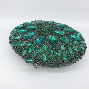 Elegant emerald green rhinestone evening clutch bag with sparkling oval crystals