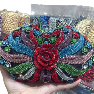 Luxury black hard shell evening clutch with red crystal rose and multicolored rhinestones