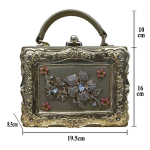 Detailed view of luxury gold evening bag with blue crystal flowers and dimensions