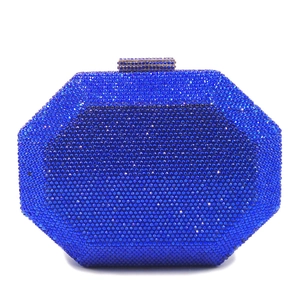 Close-up of royal blue crystal evening clutch bag with octagonal frame and top clasp