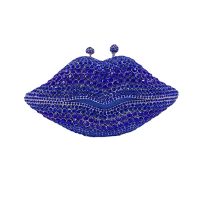 Royal blue lip-shaped evening clutch bag encrusted with sparkling rhinestones and metal frame