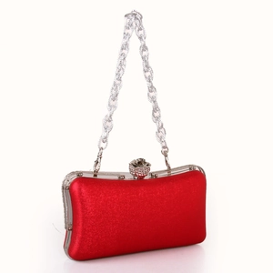 Red glitter evening clutch bag with rose crystal clasp and silver chain strap