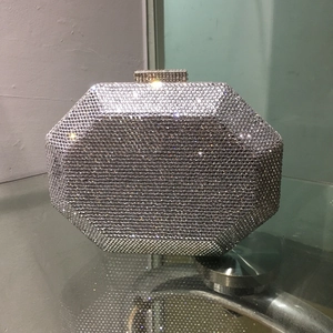 Detail of silver octagonal evening clutch with hand-set crystals and diamond clasp