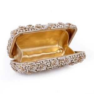 Detailed open view of a gold floral evening clutch with luxury crystal rhinestones