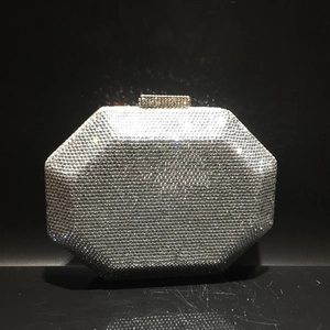 Macro view of octagonal evening clutch bag encrusted with silver rhinestones and crystals