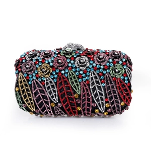 Detailed view of handmade evening clutch bag with multicolored floral rhinestones
