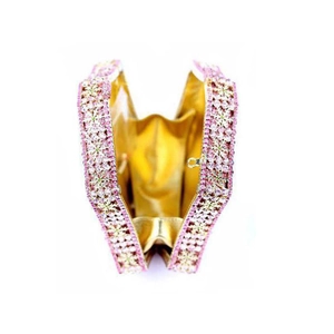 Top view of hollow evening bag showing pink crystal floral patterns and gold lining