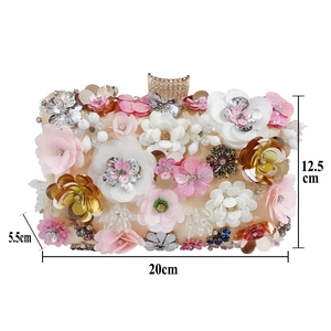 Detail showing dimensions 20cm x 12.5cm of floral beaded evening clutch with sequins