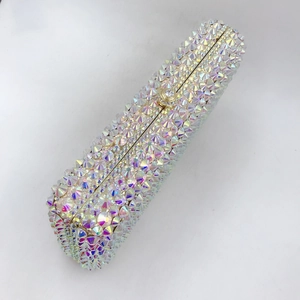 Macro detail of rectangle evening clutch bag with iridescent colorful rhinestones