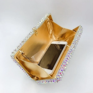 Sparkling crystal evening clutch bag with chain strap showing phone capacity