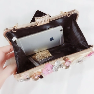 Champagne satin evening clutch bag with sequin 3D flowers and crystal lock detail