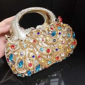 Sac de soirée luxueux en forme de phénix avec cristaux colorés et anse dorée