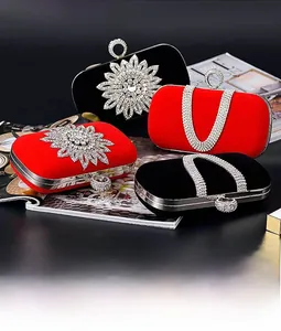 Detail of luxury velvet evening bags in red and black with sparkling crystal patterns