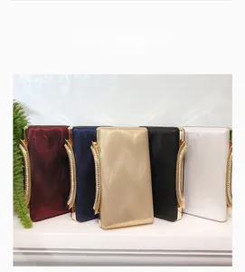 Set of five elegant PU leather evening clutch bags in various colors with rhinestone handles